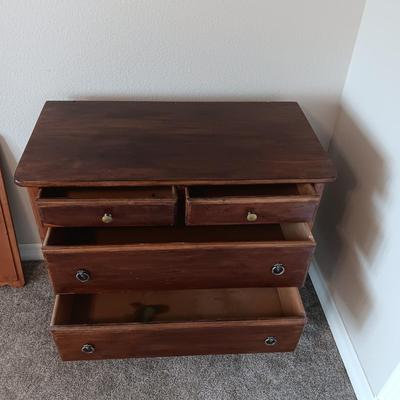 ANTIQUE CHEST OF DRAWERS AND A WALL MIRROR