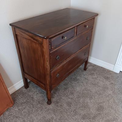 ANTIQUE CHEST OF DRAWERS AND A WALL MIRROR