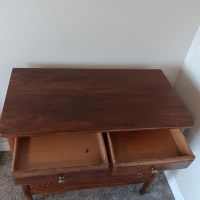 ANTIQUE CHEST OF DRAWERS AND A WALL MIRROR