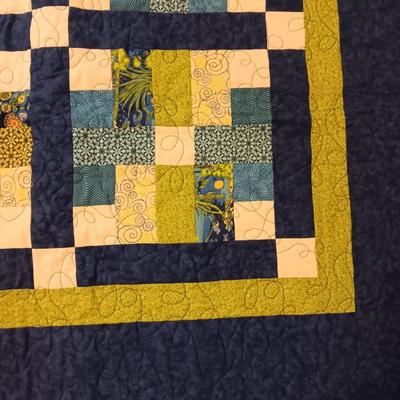 HANDMADE QUILT W/BLUES AND GREENS