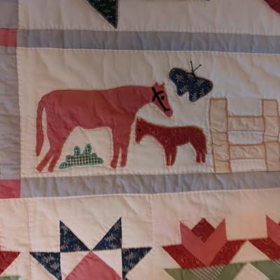 A FUN HANDMADE DETAILED QUILT