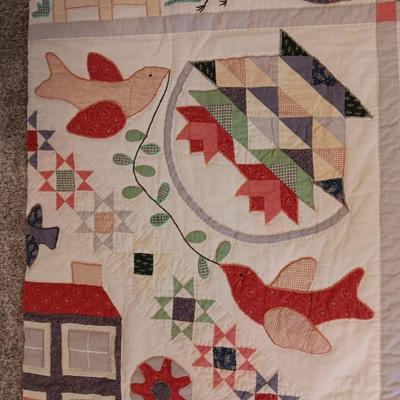A FUN HANDMADE DETAILED QUILT