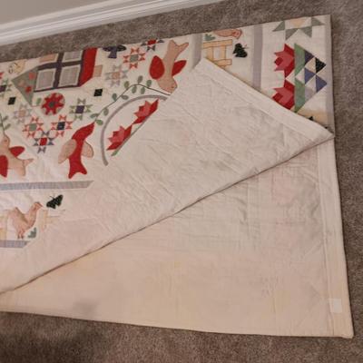 A FUN HANDMADE DETAILED QUILT
