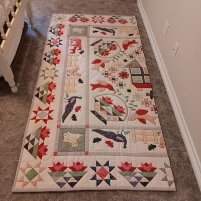 A FUN HANDMADE DETAILED QUILT