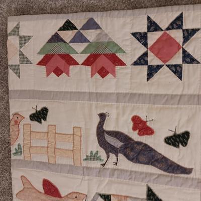 A FUN HANDMADE DETAILED QUILT