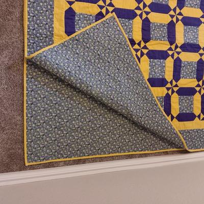 COLORFUL HANDMADE PURPLE AND GOLD QUILT