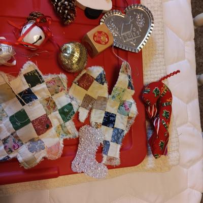 A VARIETY OF CHRISTMAS ORNAMENTS WITH AN ORGANIZING STORAGE TOTE