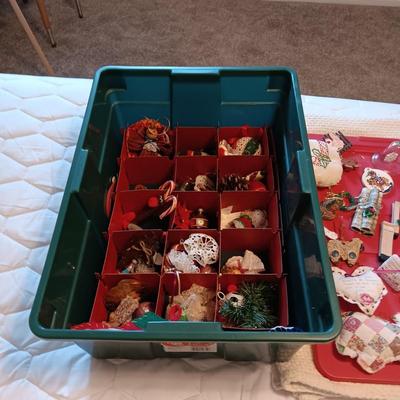 A VARIETY OF CHRISTMAS ORNAMENTS WITH AN ORGANIZING STORAGE TOTE