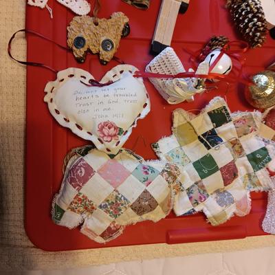 A VARIETY OF CHRISTMAS ORNAMENTS WITH AN ORGANIZING STORAGE TOTE