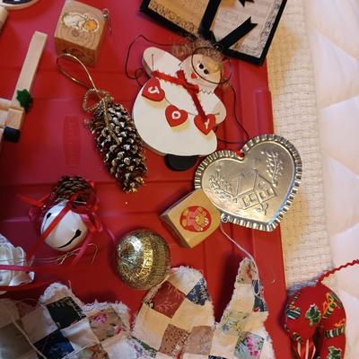 A VARIETY OF CHRISTMAS ORNAMENTS WITH AN ORGANIZING STORAGE TOTE