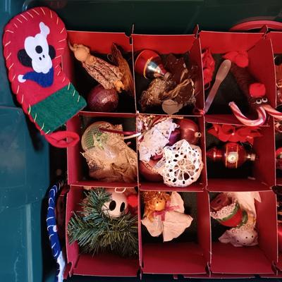 A VARIETY OF CHRISTMAS ORNAMENTS WITH AN ORGANIZING STORAGE TOTE