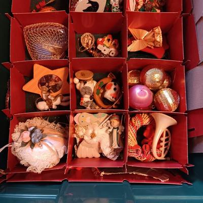 A VARIETY OF CHRISTMAS ORNAMENTS WITH AN ORGANIZING STORAGE TOTE