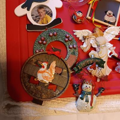 A VARIETY OF CHRISTMAS ORNAMENTS WITH AN ORGANIZING STORAGE TOTE