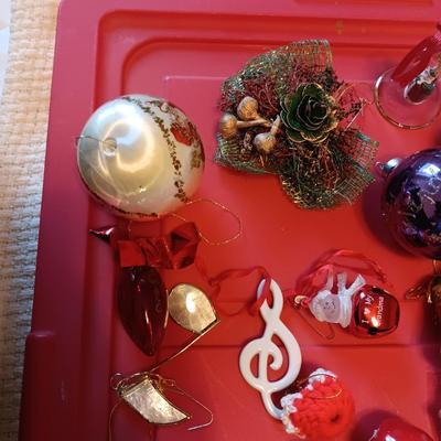 A VARIETY OF CHRISTMAS ORNAMENTS WITH AN ORGANIZING STORAGE TOTE
