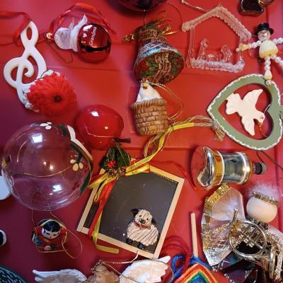 A VARIETY OF CHRISTMAS ORNAMENTS WITH AN ORGANIZING STORAGE TOTE