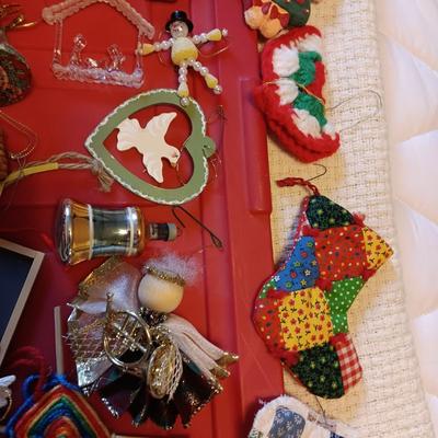 A VARIETY OF CHRISTMAS ORNAMENTS WITH AN ORGANIZING STORAGE TOTE