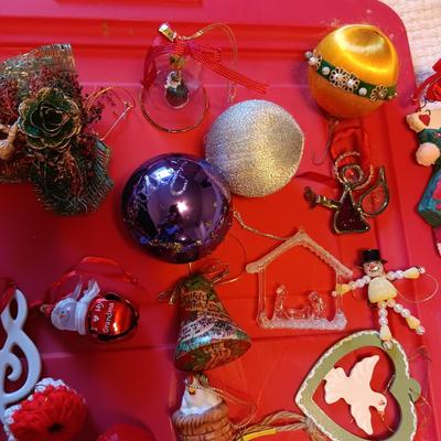 A VARIETY OF CHRISTMAS ORNAMENTS WITH AN ORGANIZING STORAGE TOTE