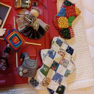 A VARIETY OF CHRISTMAS ORNAMENTS WITH AN ORGANIZING STORAGE TOTE