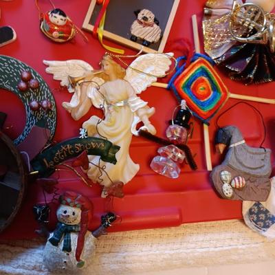 A VARIETY OF CHRISTMAS ORNAMENTS WITH AN ORGANIZING STORAGE TOTE