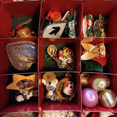 A VARIETY OF CHRISTMAS ORNAMENTS WITH AN ORGANIZING STORAGE TOTE