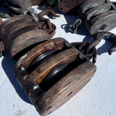 8 Antique Pulleys 