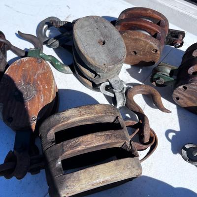 8 Antique Pulleys 