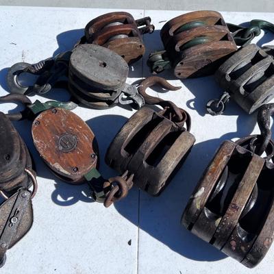 8 Antique Pulleys 