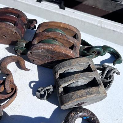 8 Antique Pulleys 