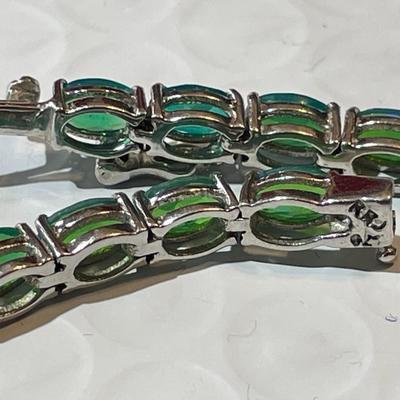 Vintage Simulated Emerald Tennis Bracelet in Sterling Silver 7.25" Long in Good Preowned Condition.