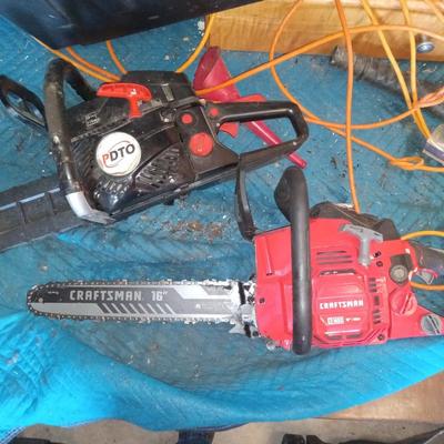 2 chainsaws