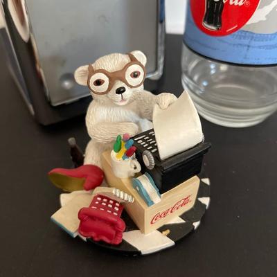 Coca-Cola napkin holder, matching Glass, and figurine
