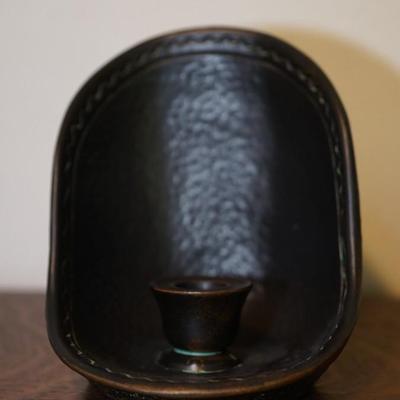 NORSE POTTERY CANDLE HOLDER W/ BACK REFLECTOR AND HANDLE.