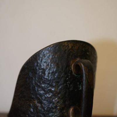 NORSE POTTERY CANDLE HOLDER W/ BACK REFLECTOR AND HANDLE.
