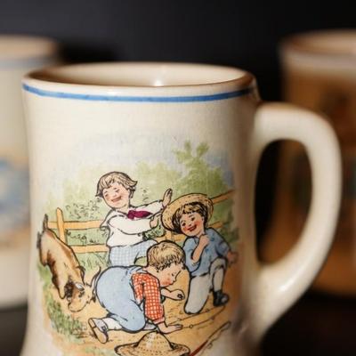 EARLY 1900'S ROSEVILLE CHILDREN CHARACTER MUG TRANSFER ON YELLOW GLAZED POTTERY MUGS