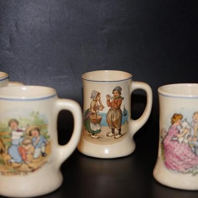EARLY 1900'S ROSEVILLE CHILDREN CHARACTER MUG TRANSFER ON YELLOW GLAZED POTTERY MUGS