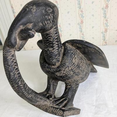 Vintage African Hand Carved Bird with Snake in its Mouth