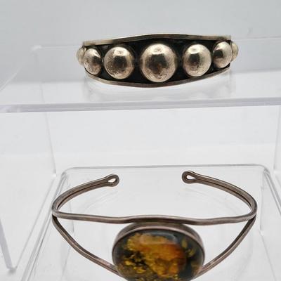 Sterling Silver Cuff Bracelets, One With Amber