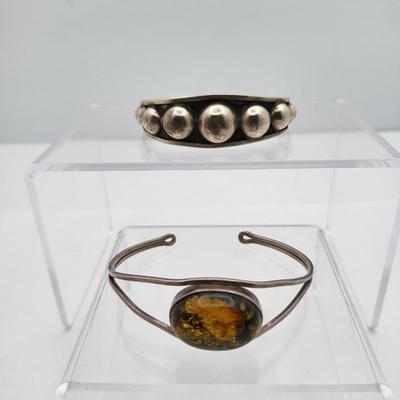 Sterling Silver Cuff Bracelets, One With Amber