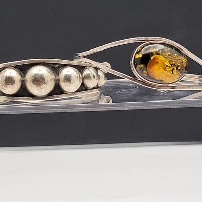 Sterling Silver Cuff Bracelets, One With Amber