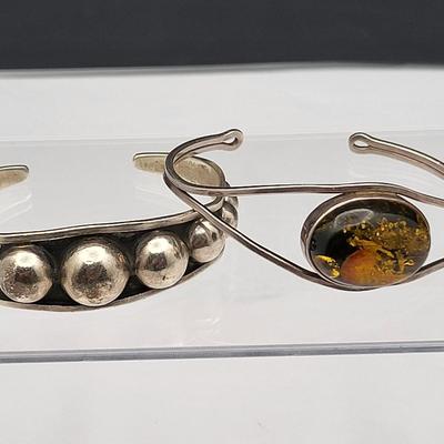 Sterling Silver Cuff Bracelets, One With Amber