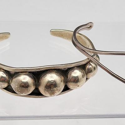 Sterling Silver Cuff Bracelets, One With Amber
