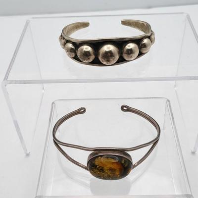 Sterling Silver Cuff Bracelets, One With Amber
