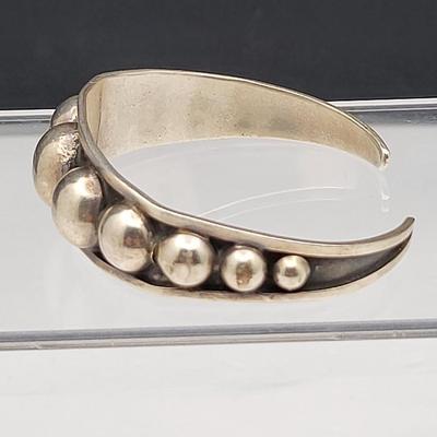 Sterling Silver Cuff Bracelets, One With Amber