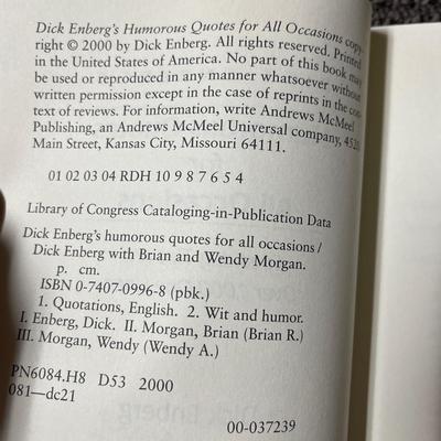 Book Lot: Dick Enberg, Pulitzer Photographs, and Fascinating Facts Dick Enberg autographed his book