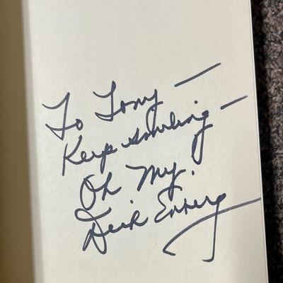 Book Lot: Dick Enberg, Pulitzer Photographs, and Fascinating Facts Dick Enberg autographed his book