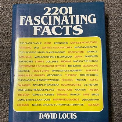 Book Lot: Dick Enberg, Pulitzer Photographs, and Fascinating Facts Dick Enberg autographed his book
