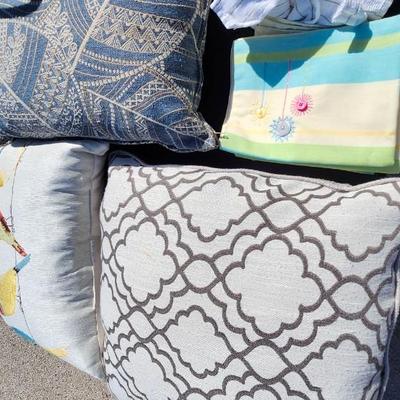 Basket, pillow and linens