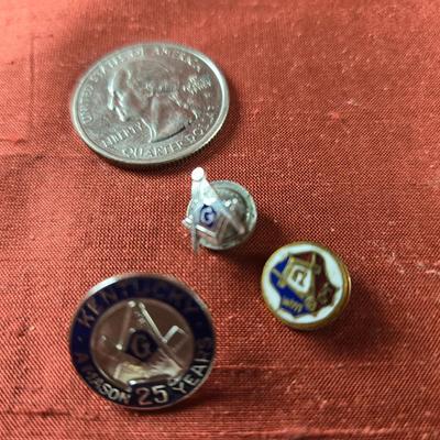 Sale Photo Thumbnail #14: This auction lot is for a Trio of Masonic Pins.  The small one is marked 14K Gold.  All are in good condition.