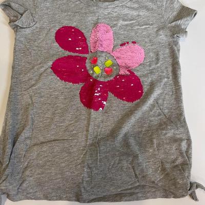 5 Girls Tees size 7T-8T and one child medium