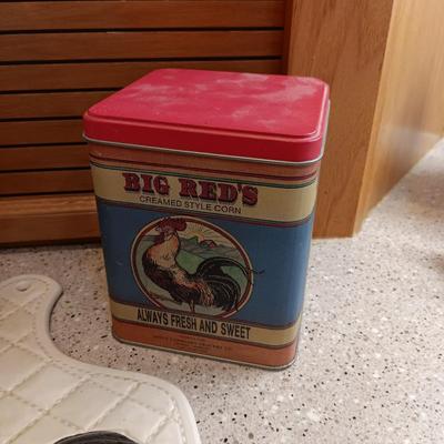 WOODEN ROOSTER, CERAMIC CUTTING BOARD AND A TIN